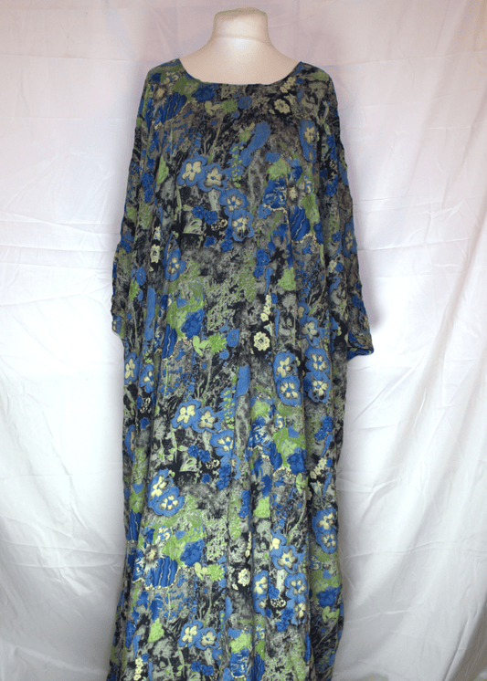 Floral Green and Blue patterned Somali Baati on a mannequin against a white background