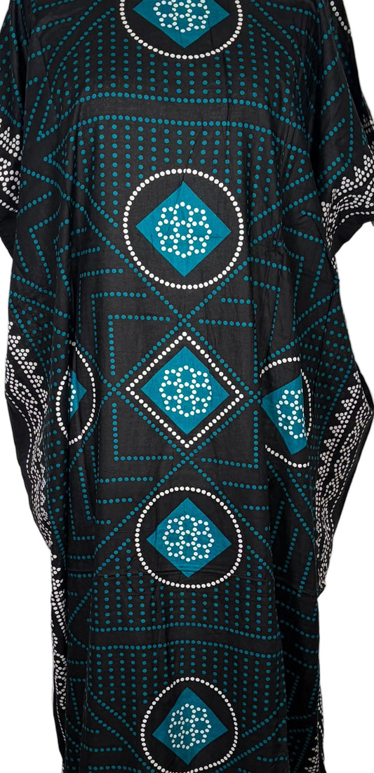 Black Somali Baati dress with blue patterns on a mannequin against a white background