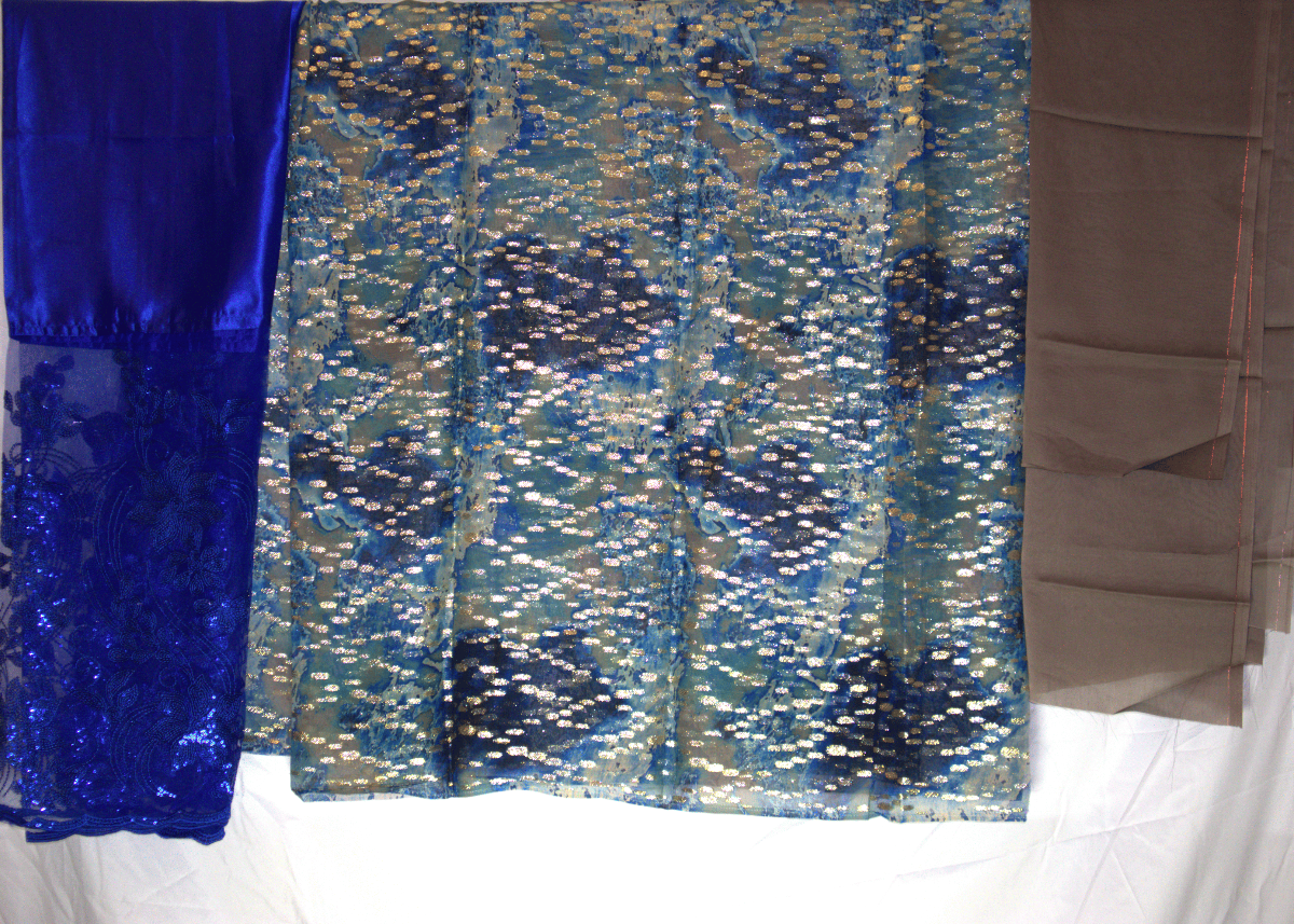 Textured fabric with blue and beige pattern on a white background