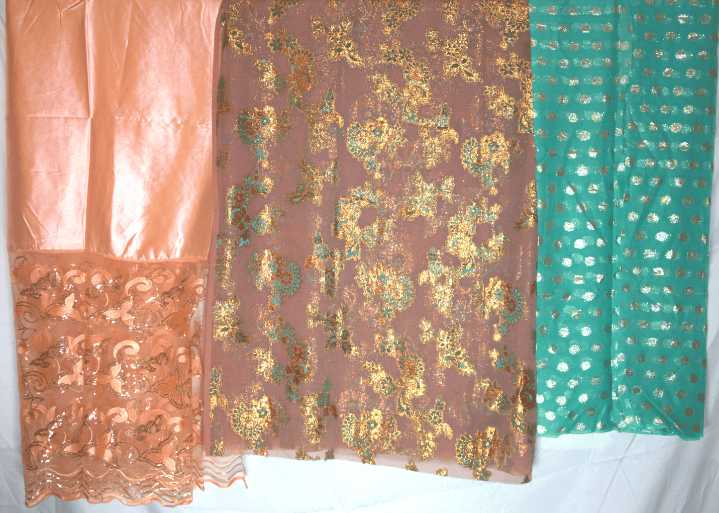 Three pieces of fabric with different patterns and colors