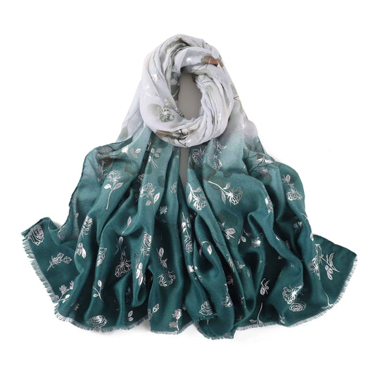Green floral patterned scarf on a white background