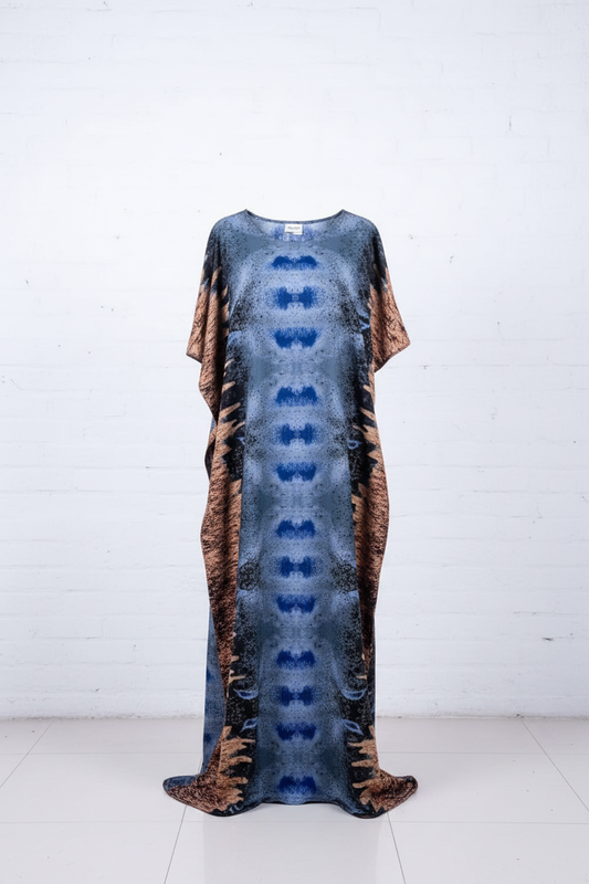 Long Somali baati dress with a tie-dye pattern on a white background