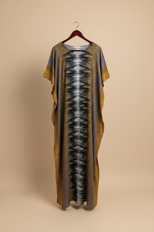 Long Somali baati dress with a pattern on a beige background
