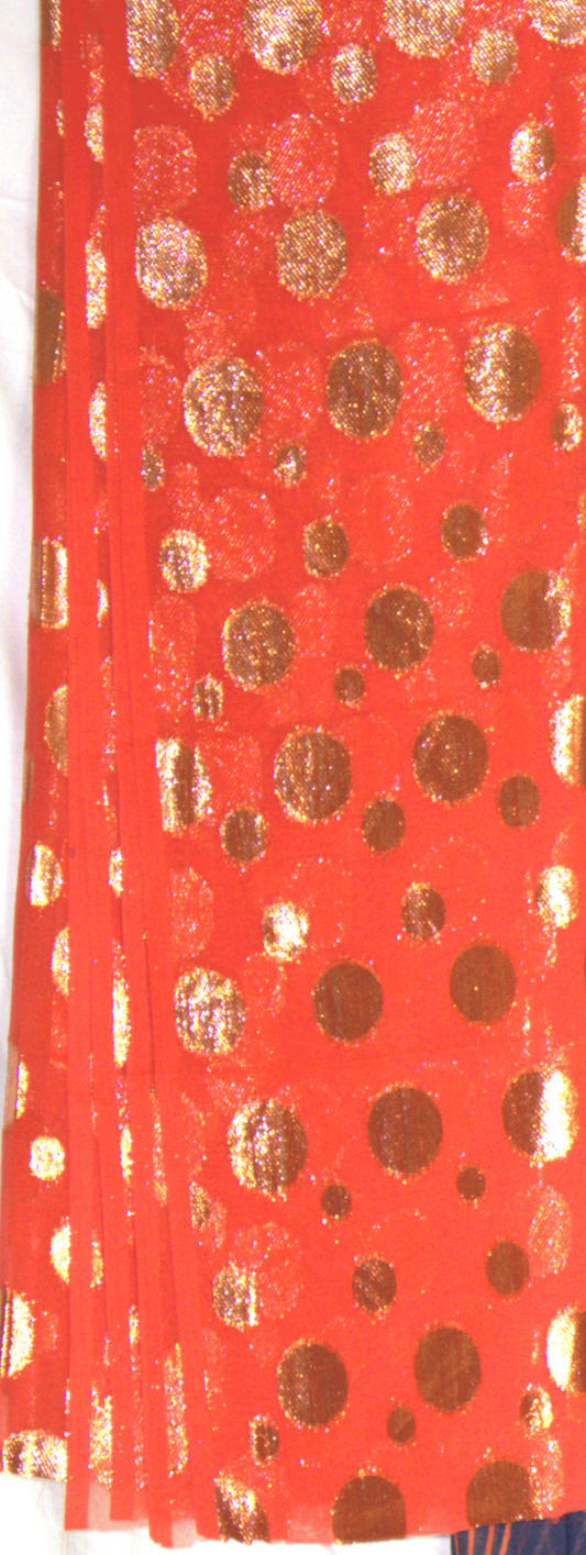 Orange Garbasaar fabric with gold polka dots