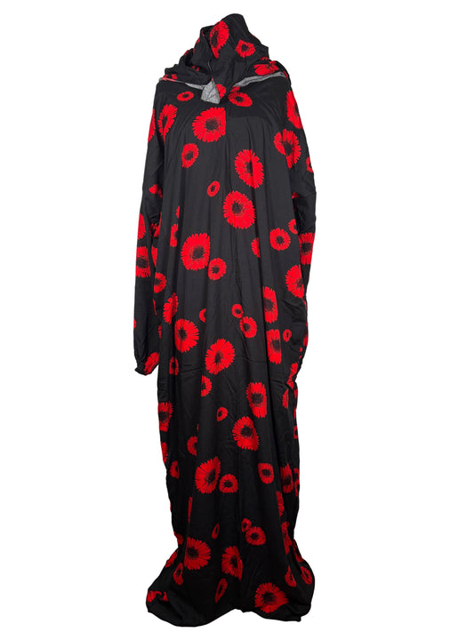 Prayer dress with red floral patterns on a white background