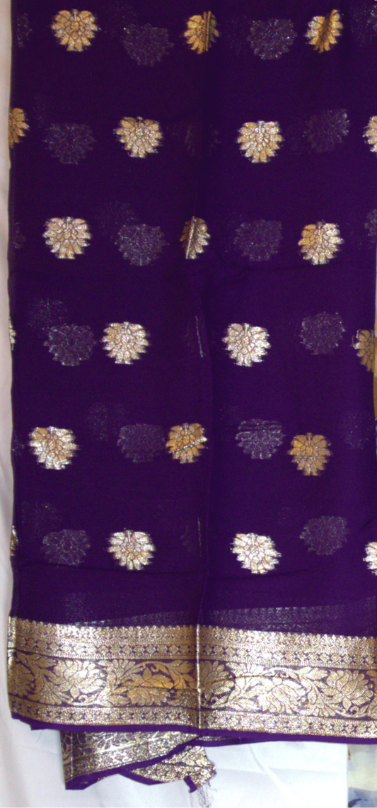 Purple Garbasaar fabric with gold floral patterns and border on a white background