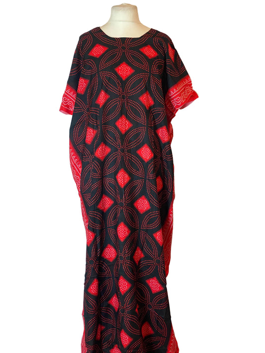 Black Somali Baati with red geometric pattern on a white background