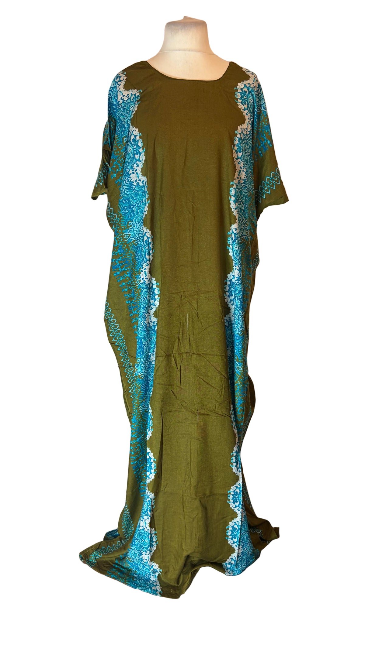 An olive green Somali Baati dress with turquoise and white patterned side panels, displayed on a mannequin in front of a white fabric backdrop.