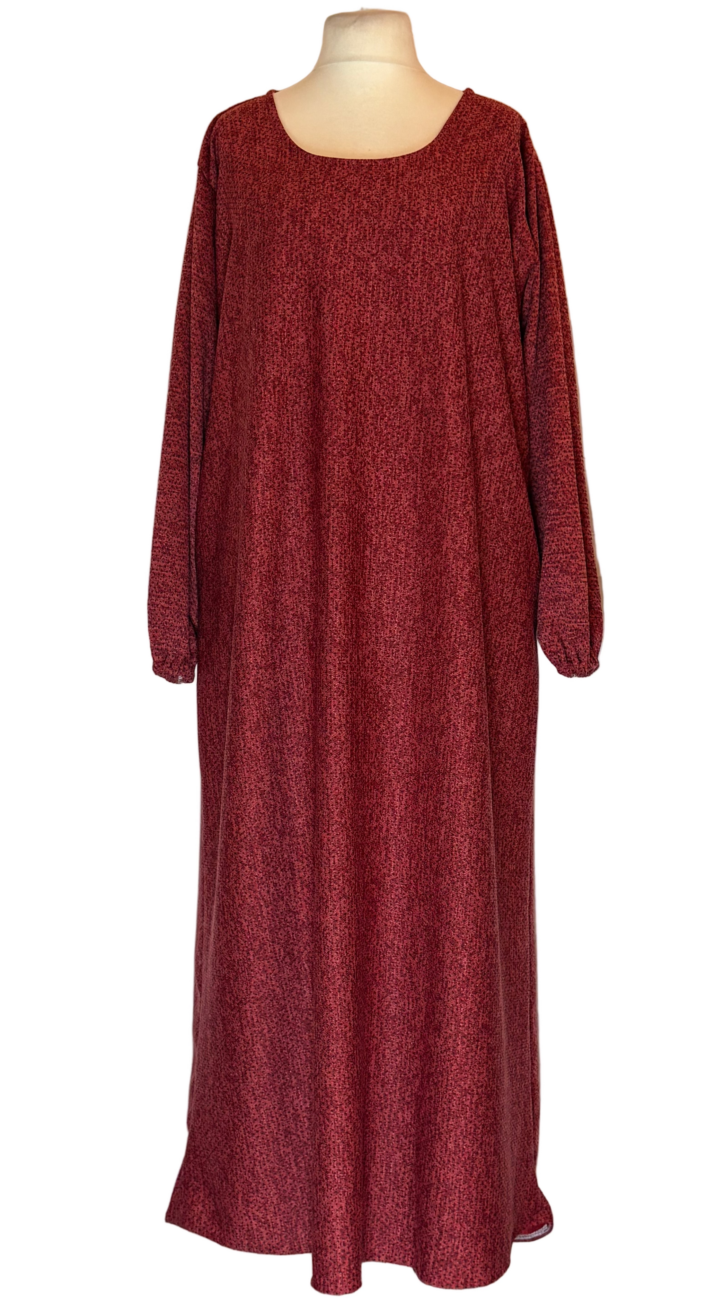 Red long-sleeve dress on a mannequin against a white background