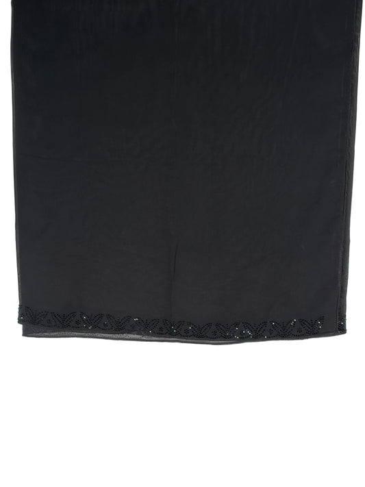 Black fabric with decorative trim on a white background
