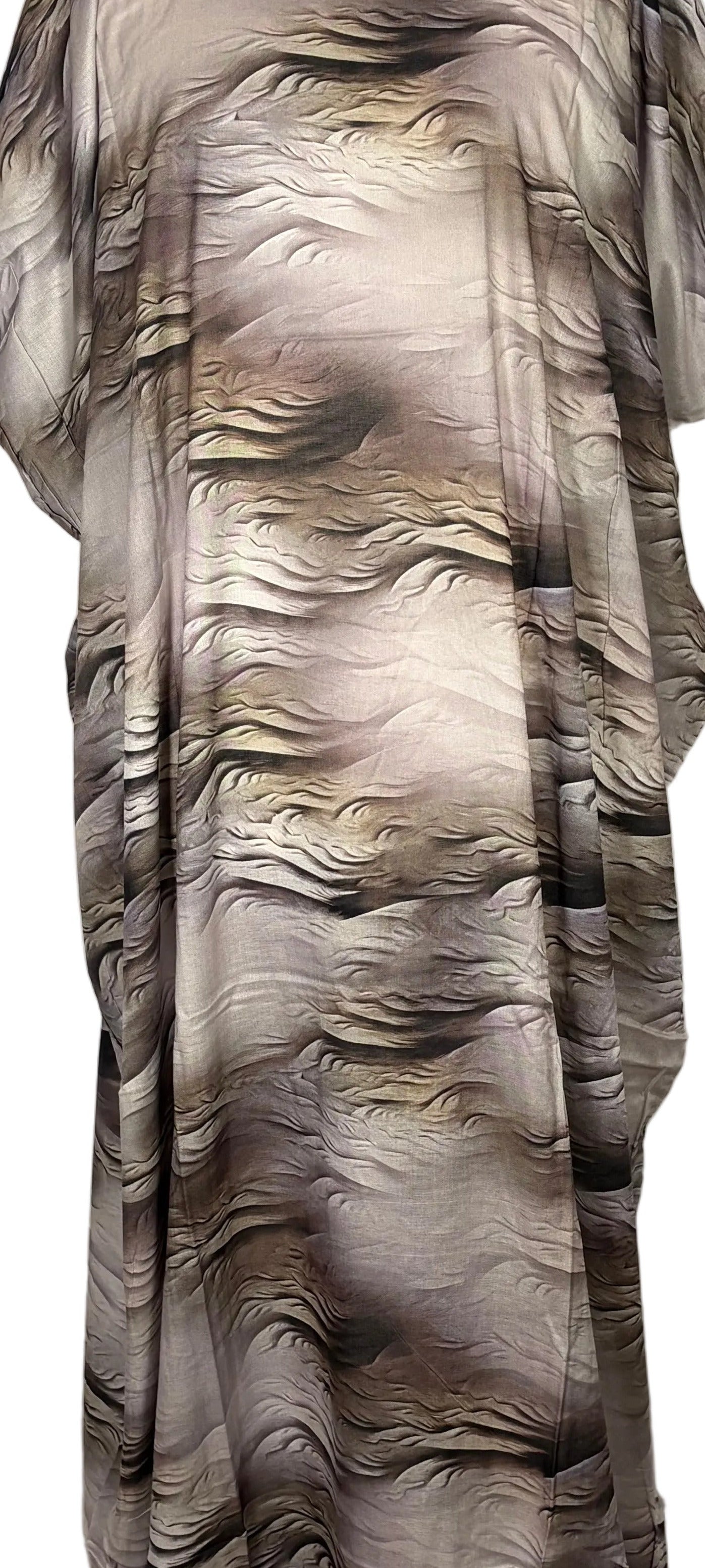 Mannequin wearing a long, patterned Somali Baati dress on a white backdrop with wooden floor.