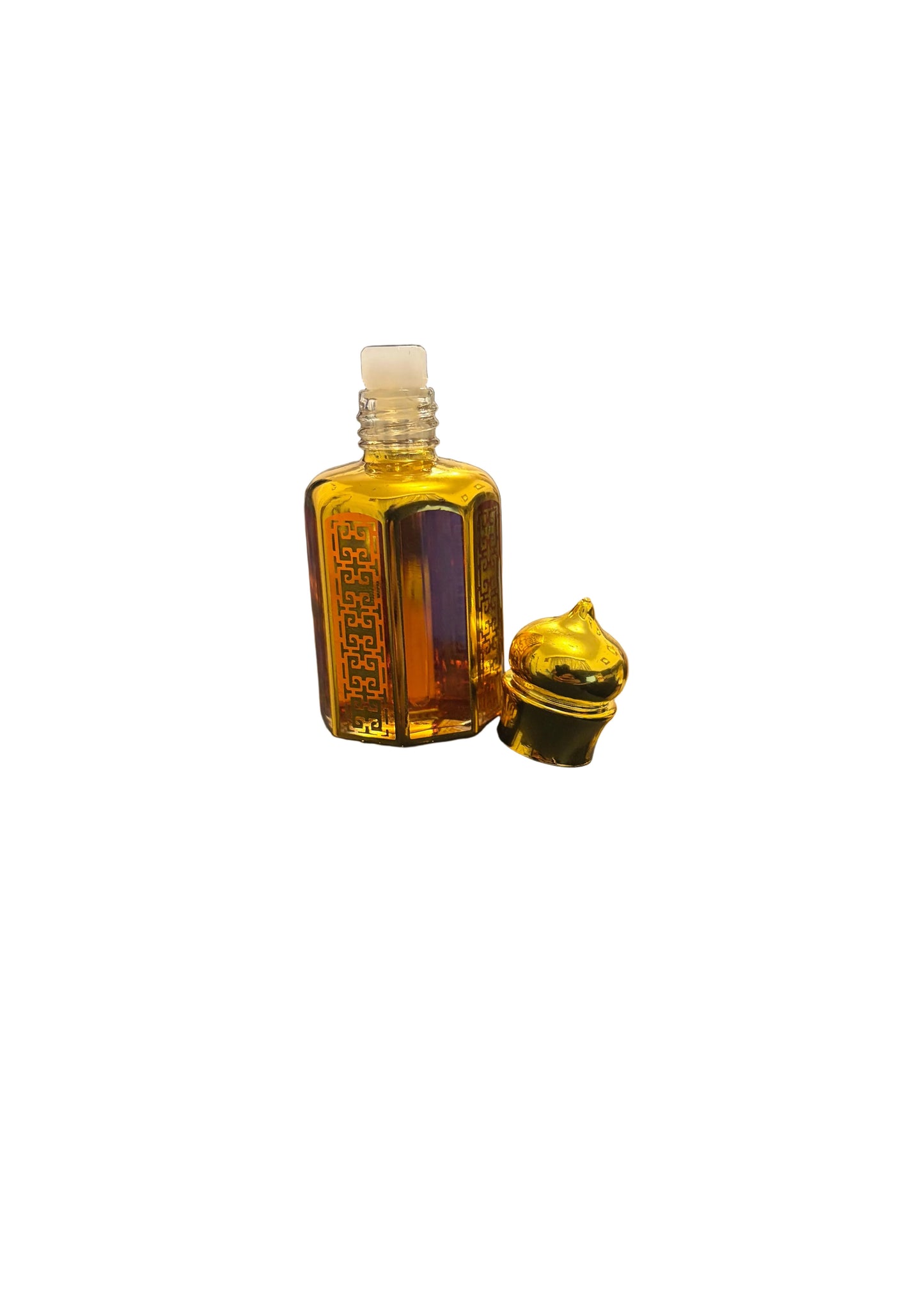 Al Maish concentrated perfume oil bottle open with gold domed stopper beside it on black fabric