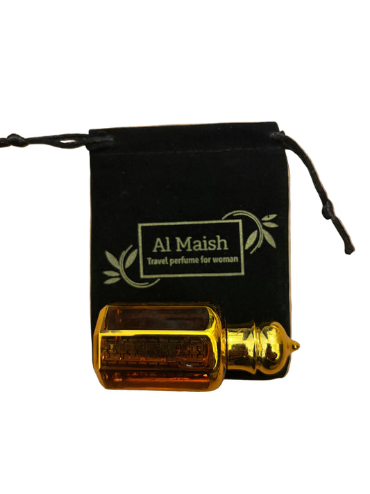 Al Maish Travel Perfume for Woman bottle and pouch flat lay on wooden surface