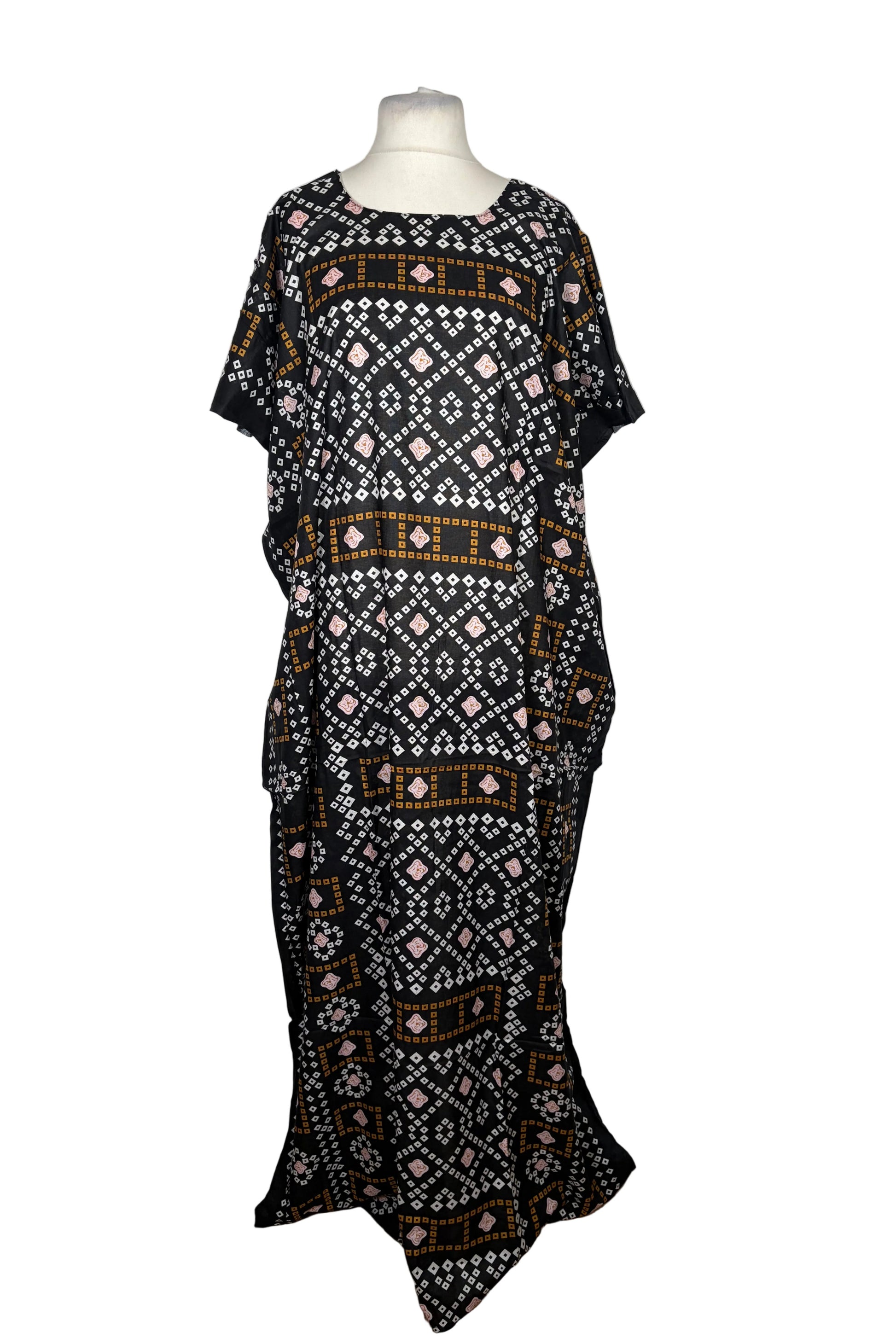 Black patterned Baati dress on a mannequin against a white background