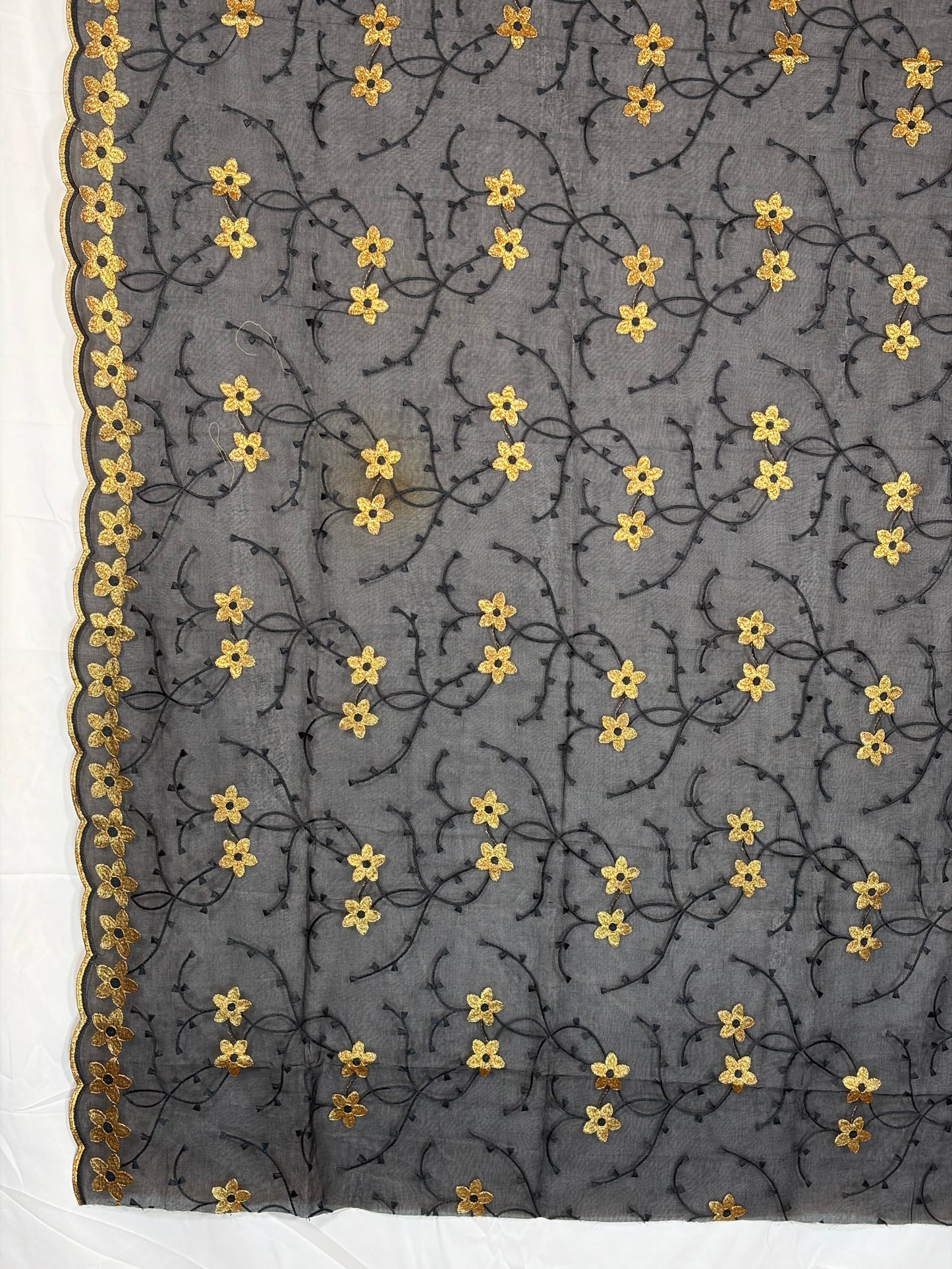 Black & Gold fabric with gold floral pattern