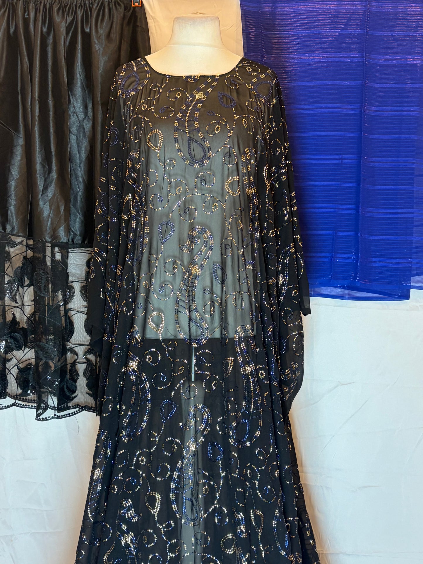 Black Maysa Dirac dress with Garbasaar and gorogard on a white background