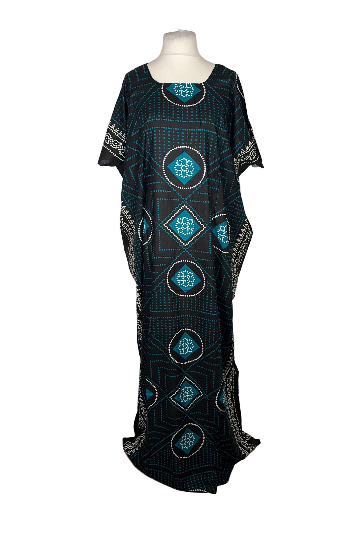Black Somali Baati dress with blue patterns on a mannequin against a white background