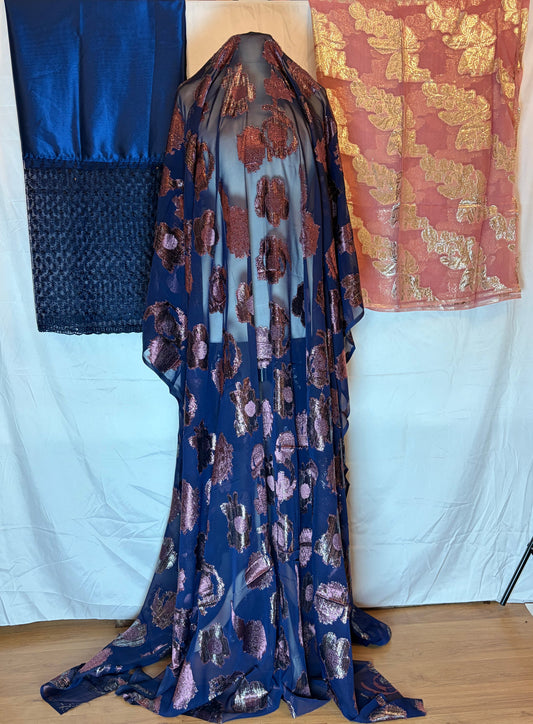 Blue fabric with floral pattern on a white surface