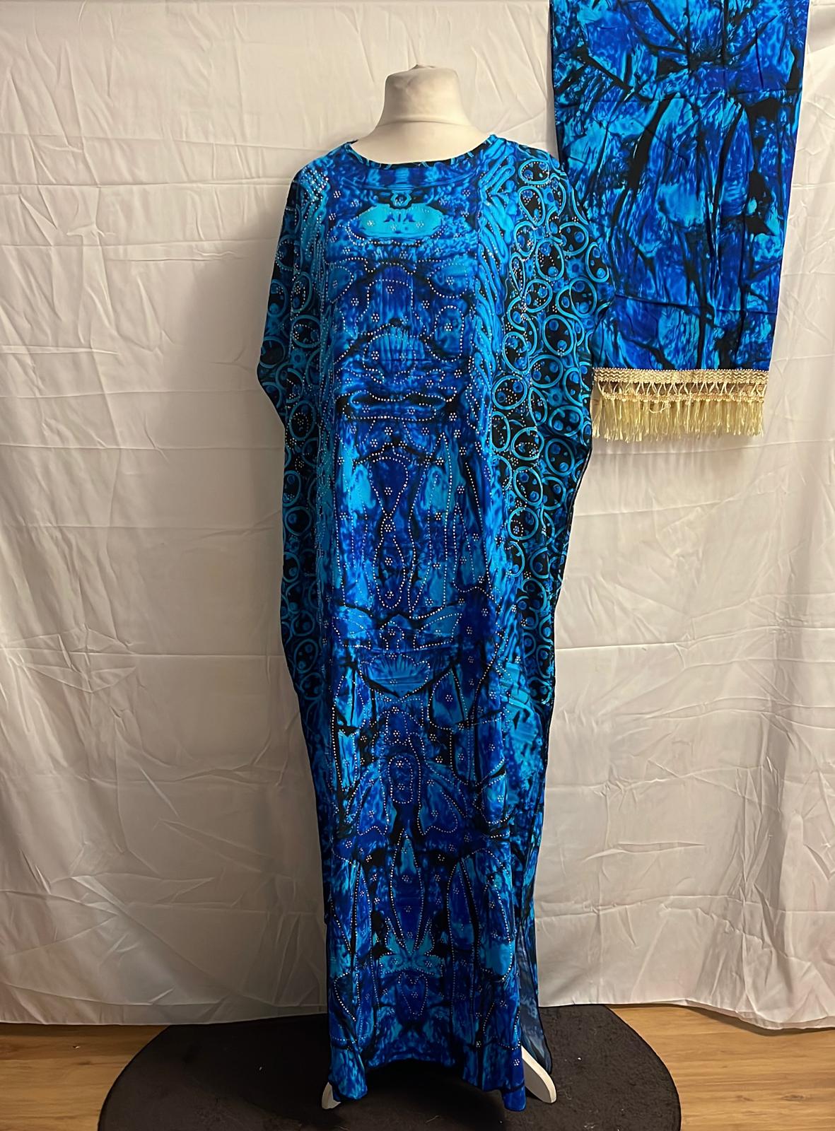 Blue patterned Somali Baati on a mannequin against a white background