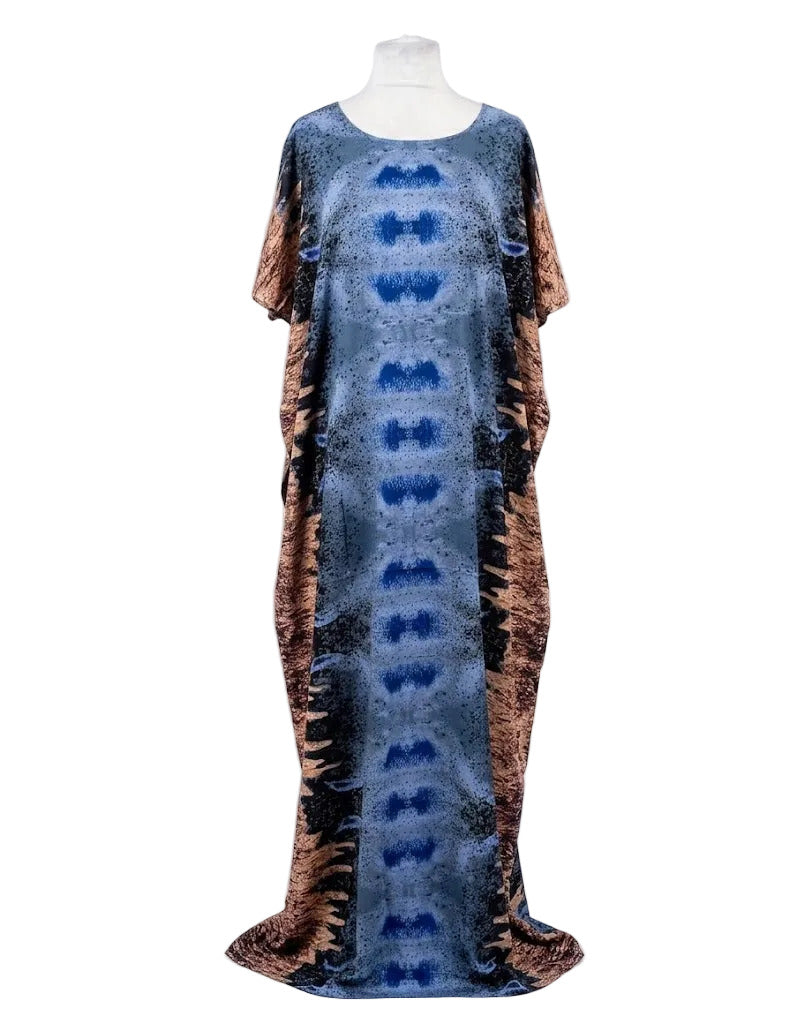 Somali Baati dress with tie-dye pattern on a mannequin against a white background