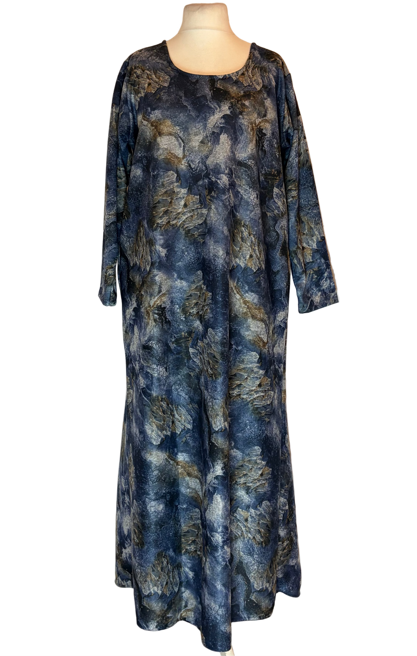 Long floral dress on a mannequin against a white background