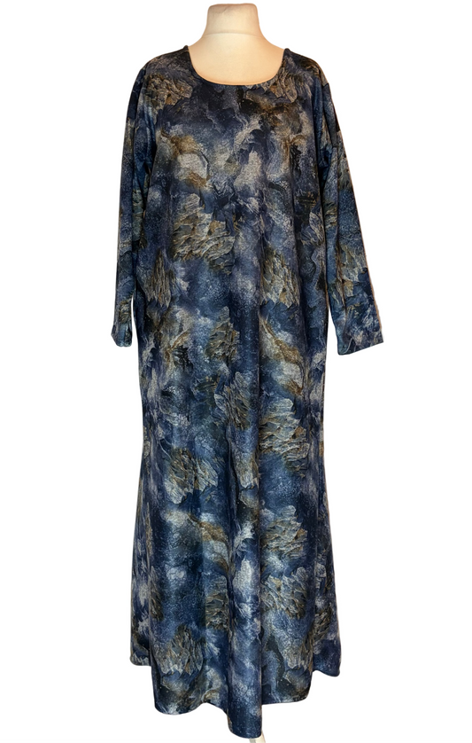 Long floral dress on a mannequin against a white background