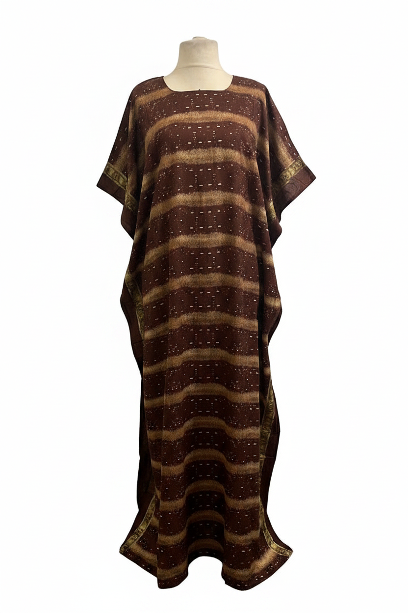 Brown and beige striped dress on a mannequin against a white background