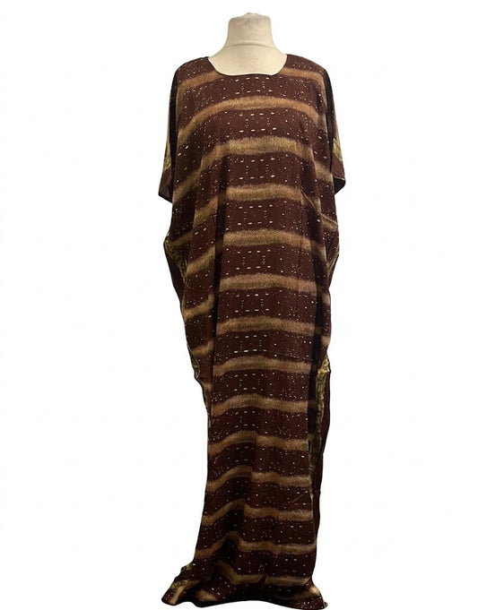 Brown and beige striped Somali baati dress on a mannequin against a white background