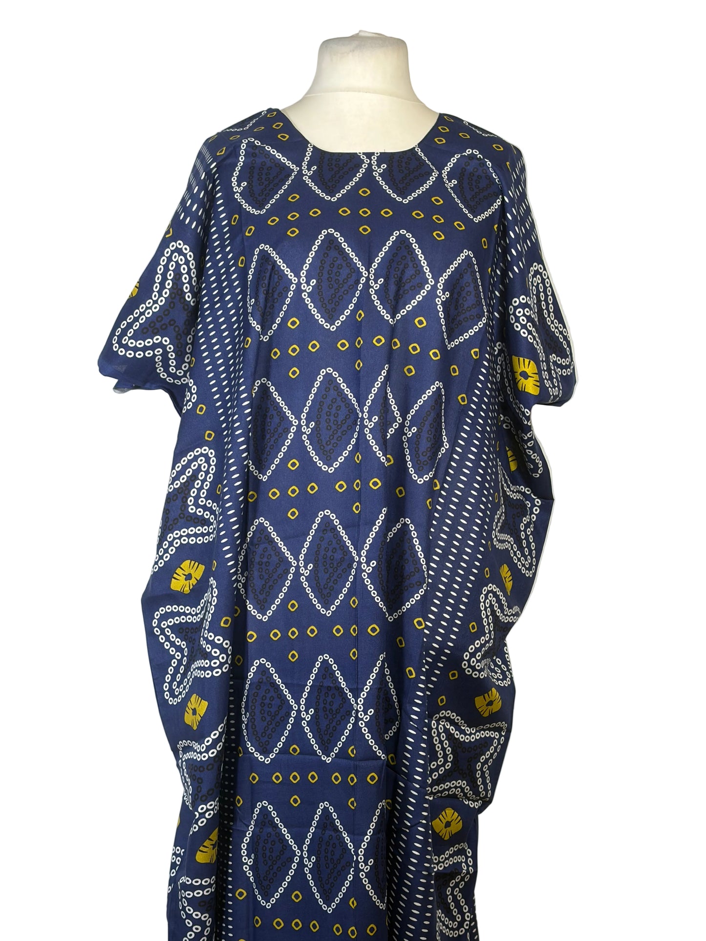 Blue patterned fabric on a mannequin with a white background