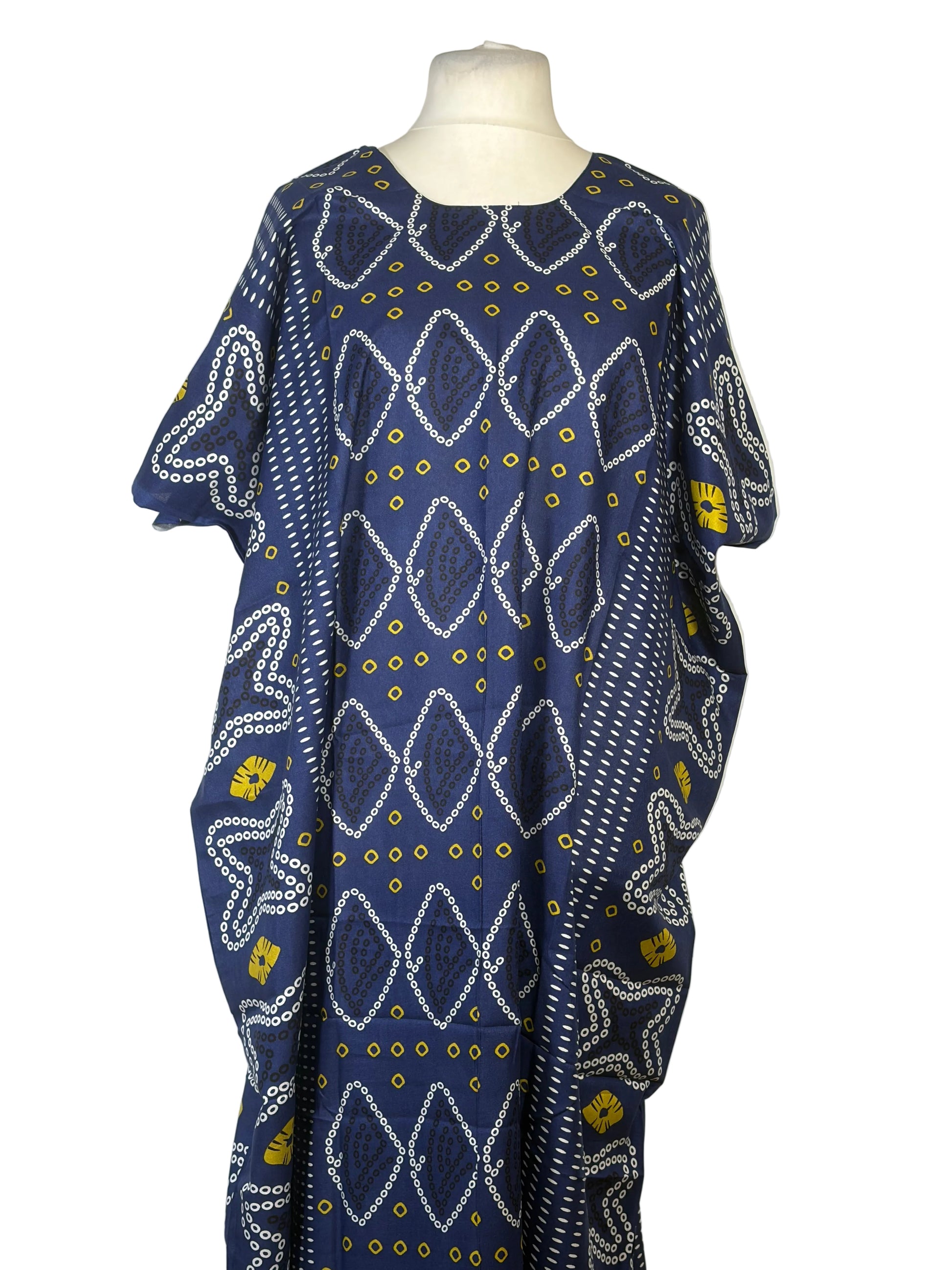 Blue patterned fabric on a mannequin with a white background