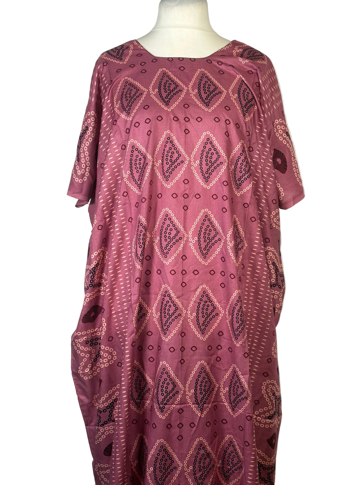 Pink patterned Somali Baati on a mannequin against a white background
