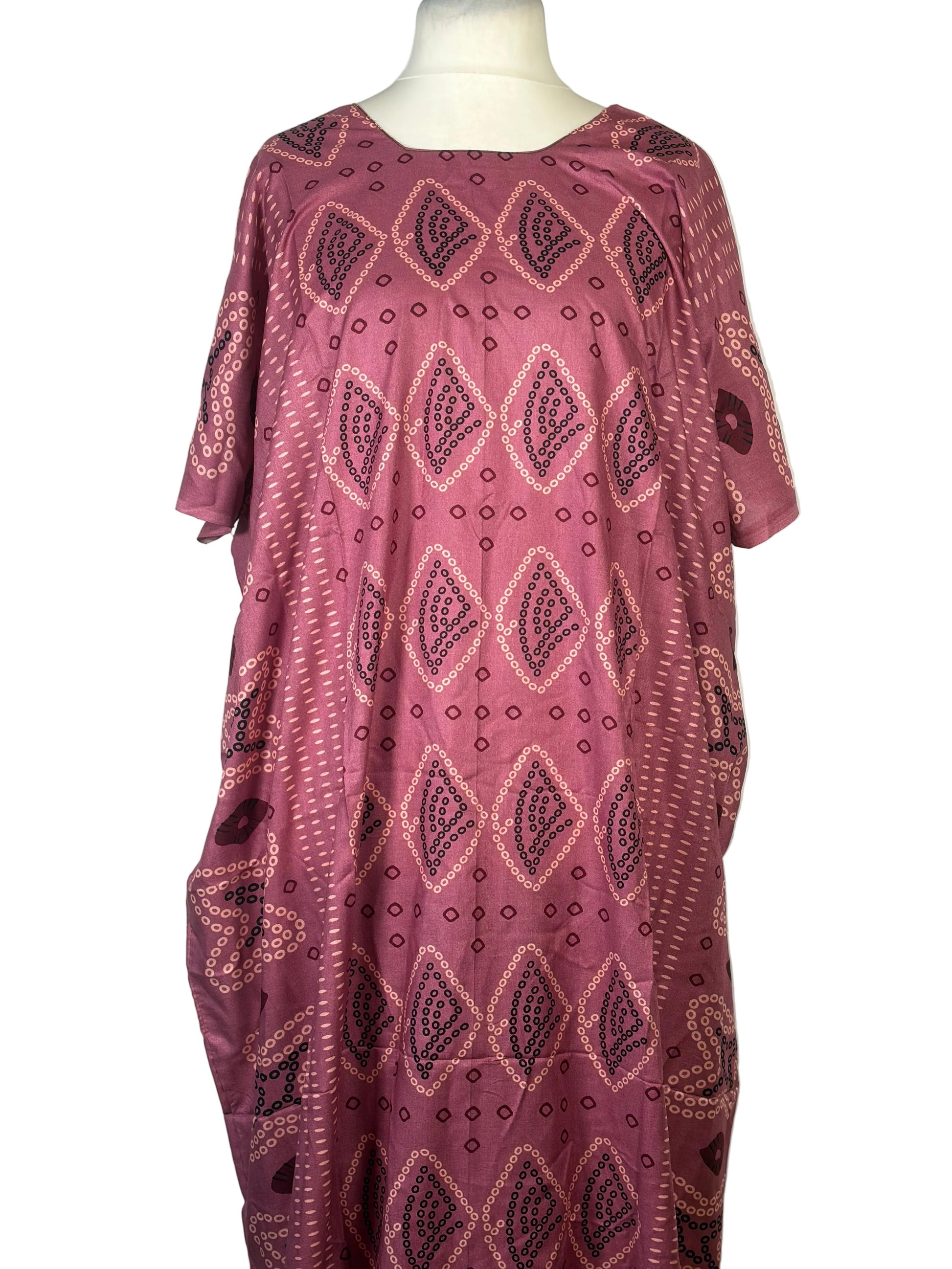 Pink patterned Somali Baati on a mannequin against a white background