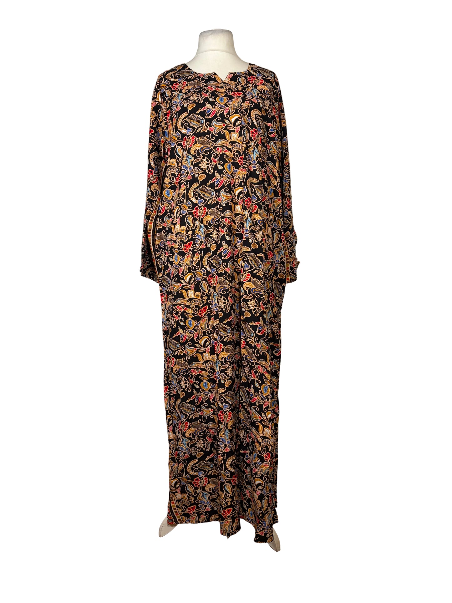 Floral-patterned fabric on a mannequin against a white backdrop