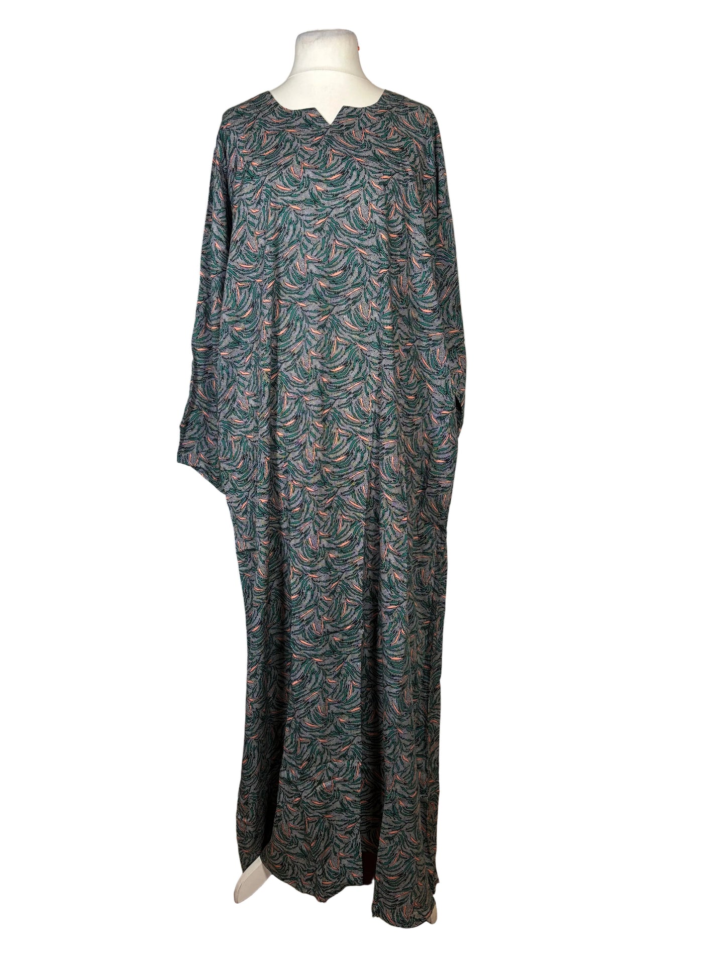 Floral-patterned pants on a mannequin against a white backdrop