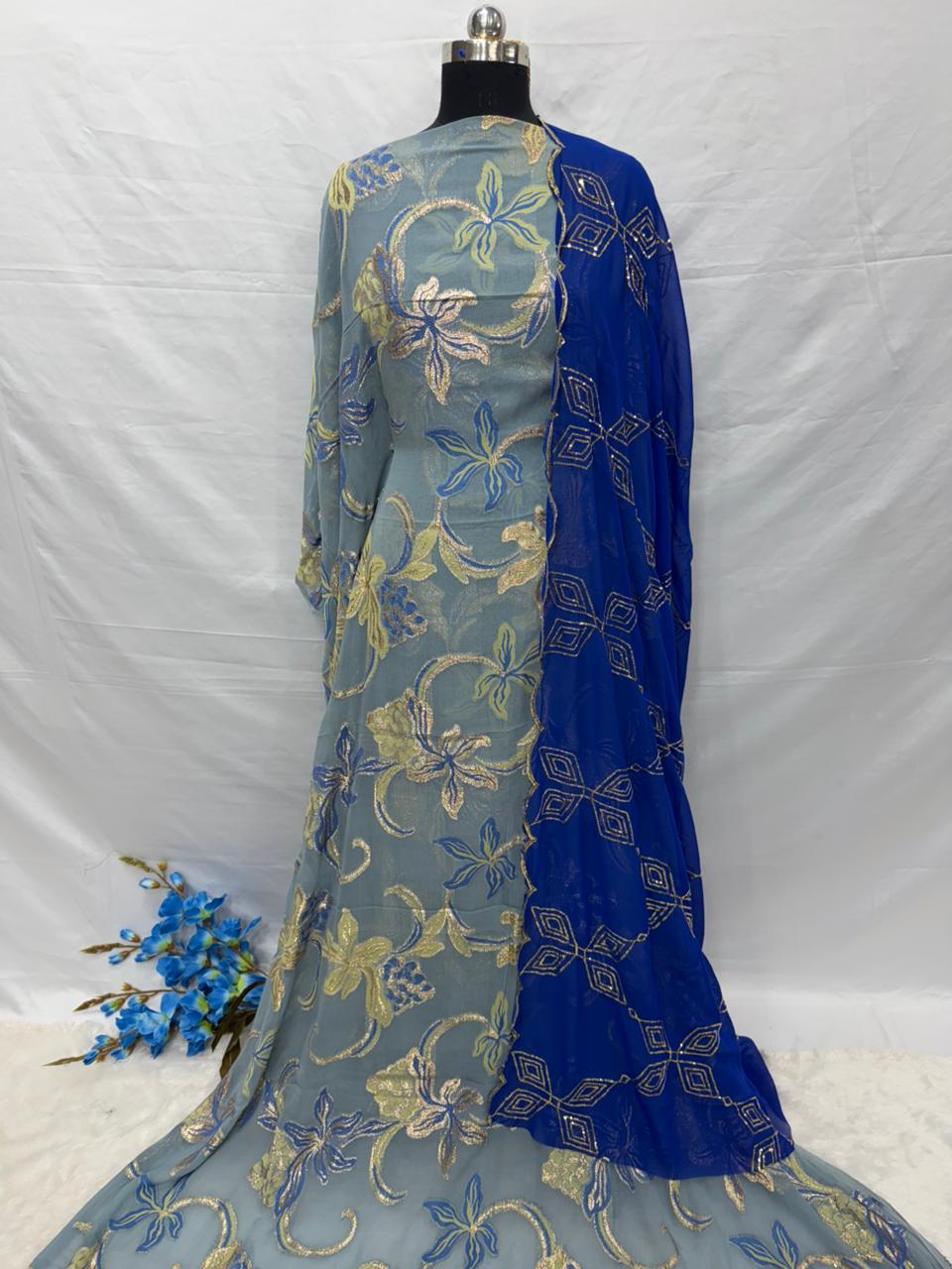 Somali Dirac Fabric with floral patterns on a white background