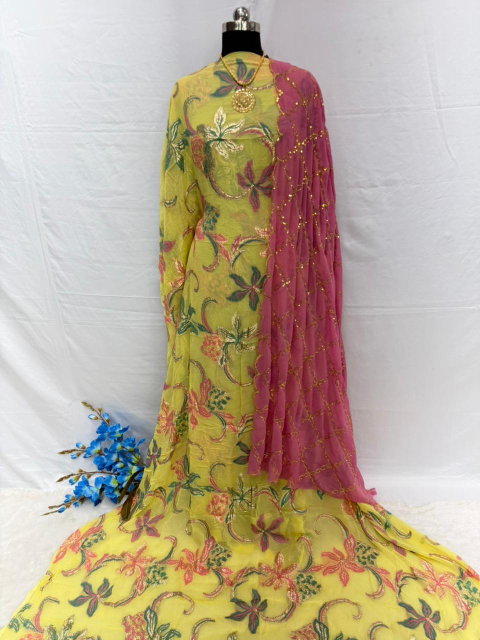 Yellow floral Somali Dirac Fabric Full set with pink dupatta on a white background