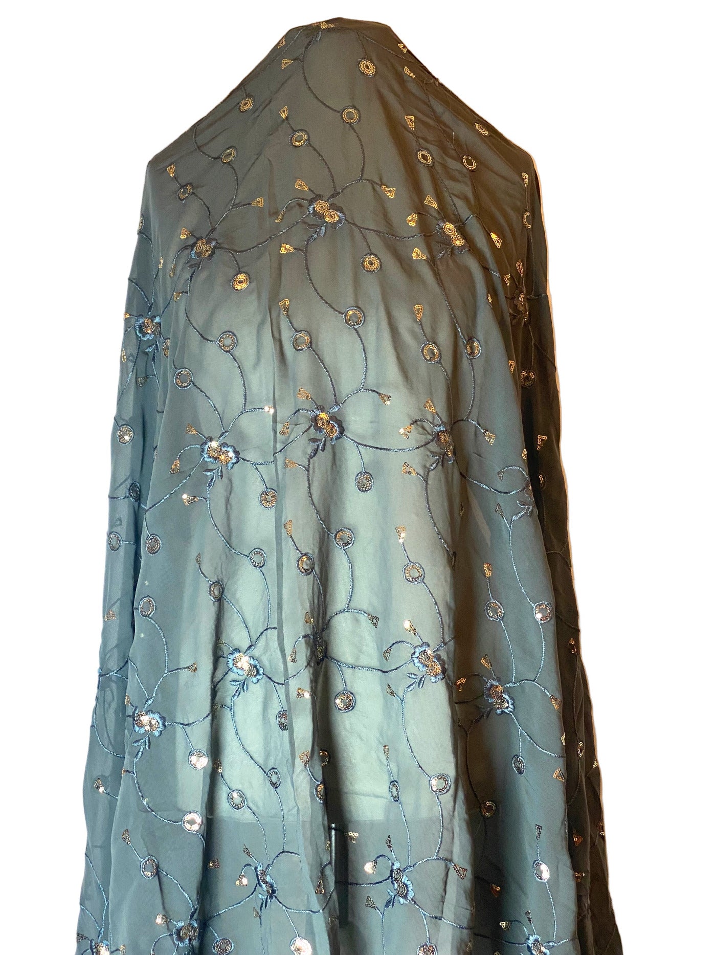 Blue embroidered Somali Garabasaar fabric on a White background