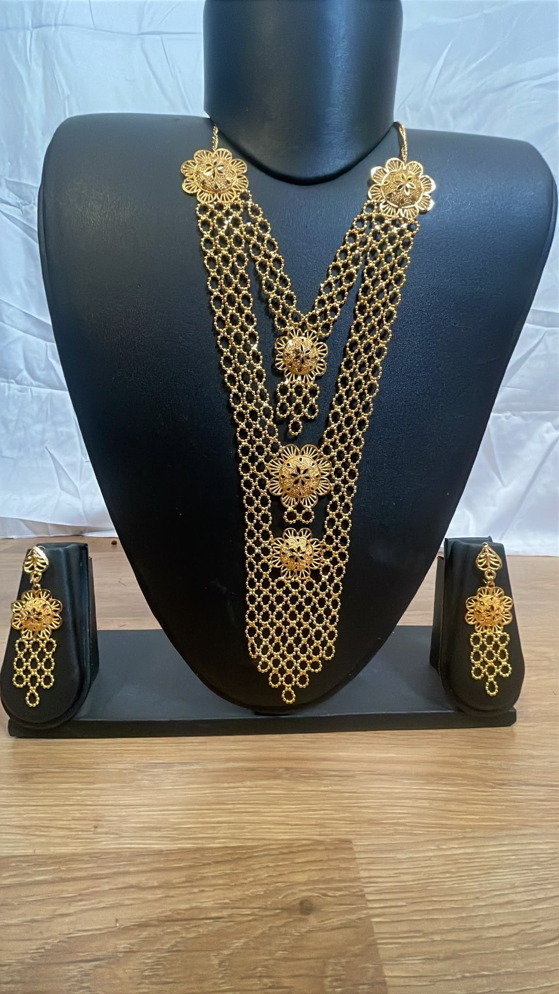 Gold Filigree Cascade Necklace and Earring Set – side angle on mannequin