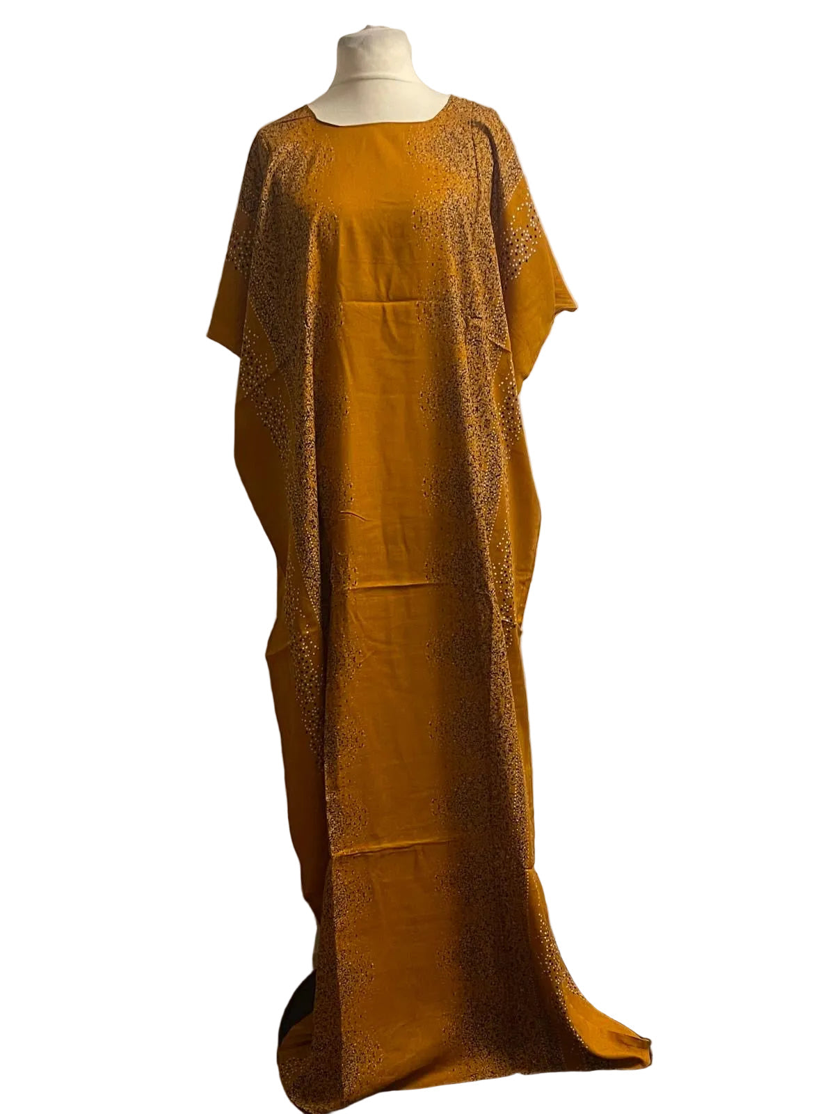 Mustard yellow Somali baati dress with lace details on a mannequin against a white background