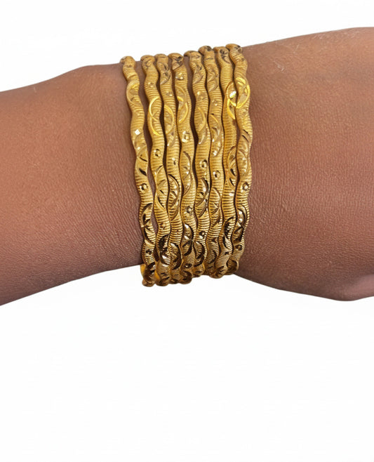 Gold Twisted Wave Bangles Set – 8 Pieces