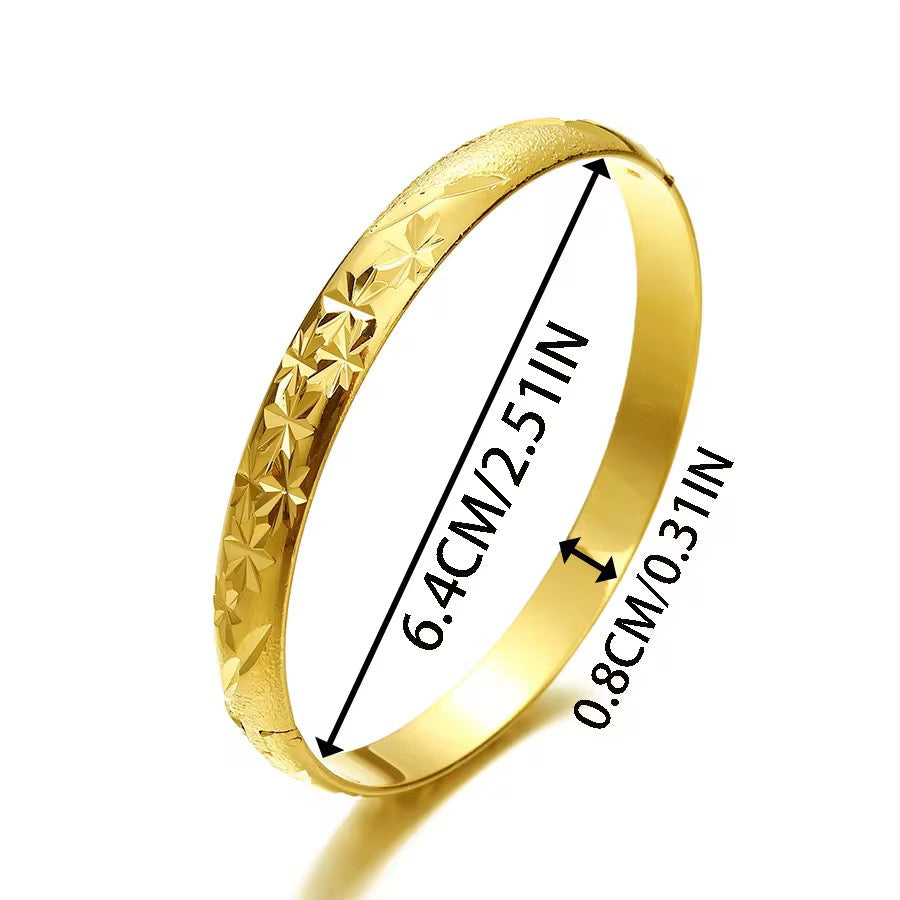 Gold ring with measurements on a white background