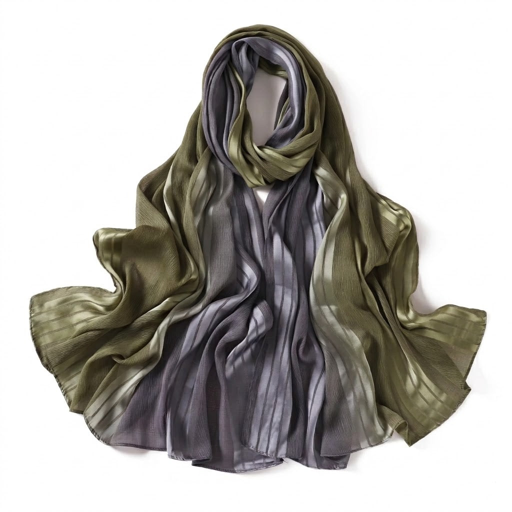 Gradient scarf transitioning from green to gray on a white background