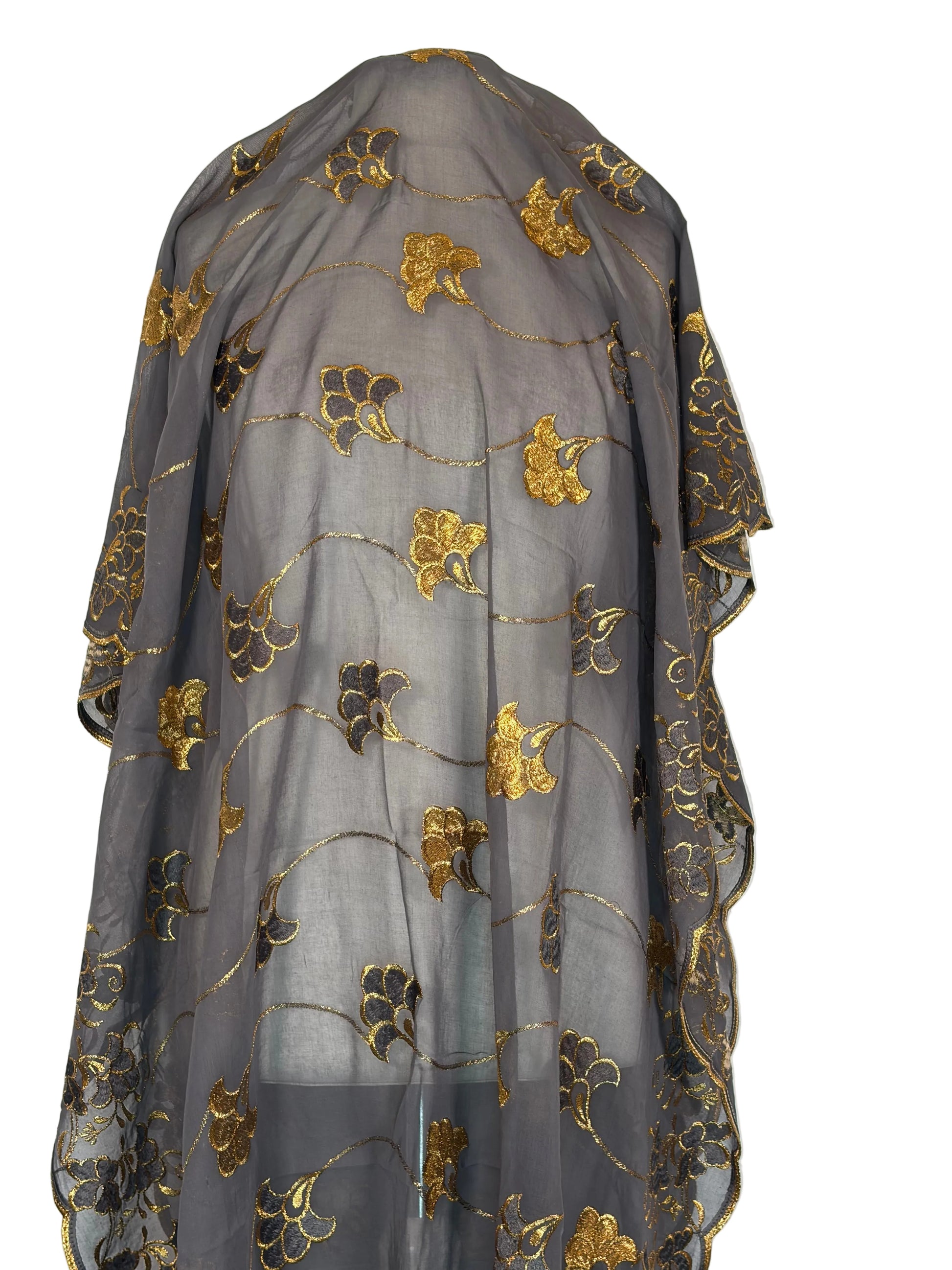 Grey Garbasaar  fabric with gold floral embroidery on a white background