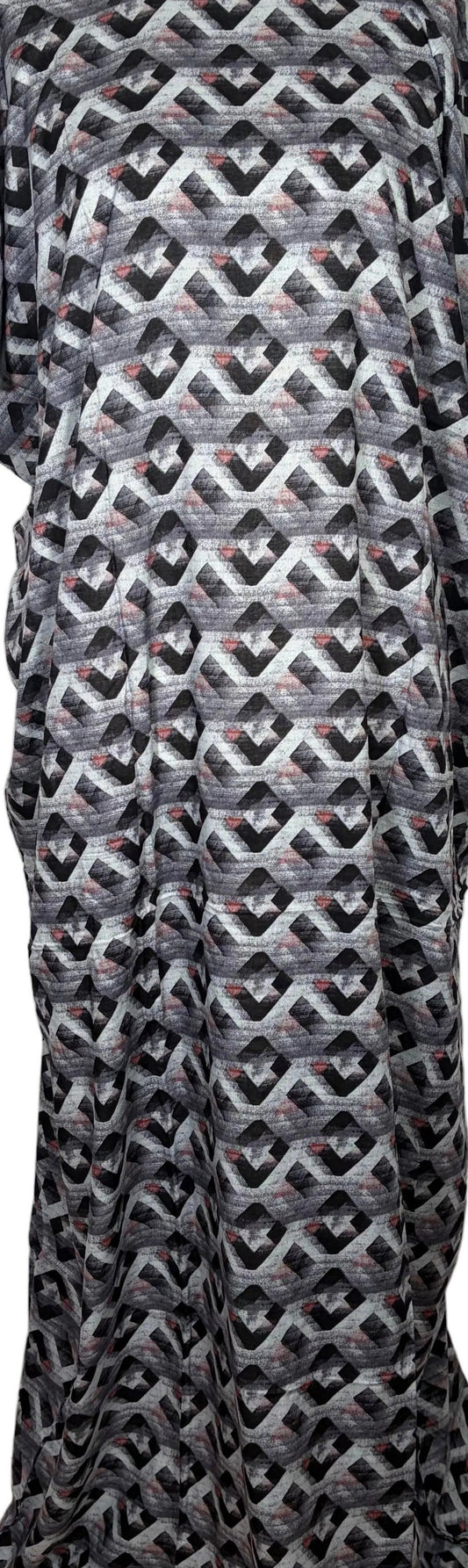 Black and white patterned Baati dress on a mannequin against a white background