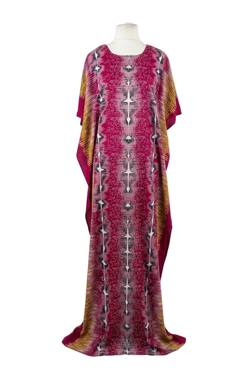 Long Somali baati patterned dress on a mannequin against a white background