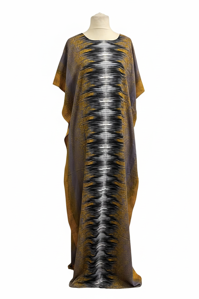 Long Somali baati dress with a pattern on a mannequin against a white background