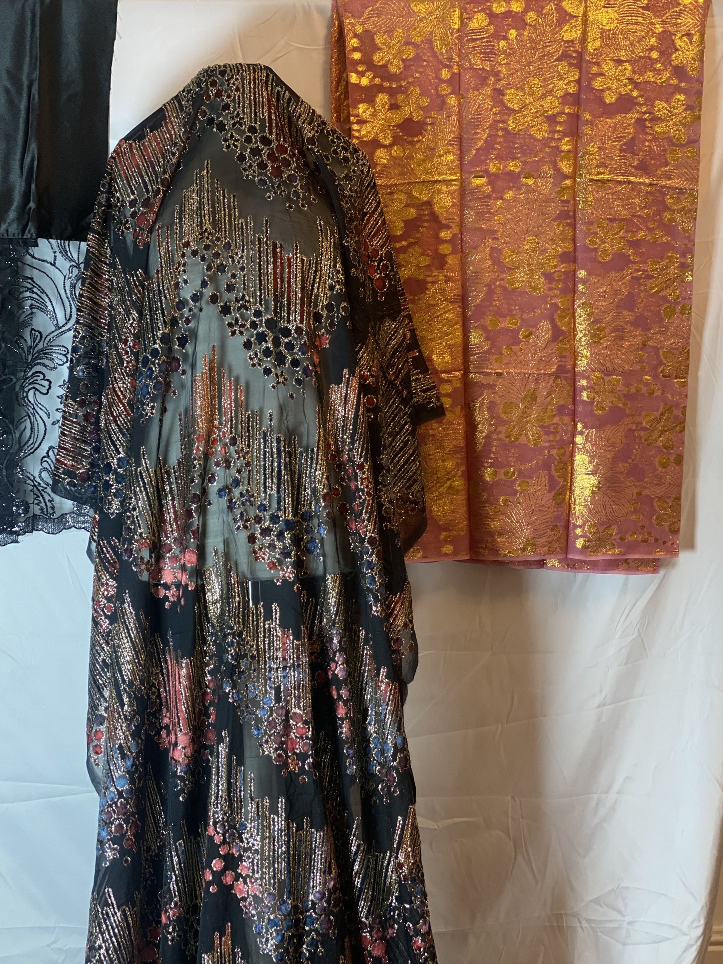 Somali Mapbal fabric with intricate patterns on a white background