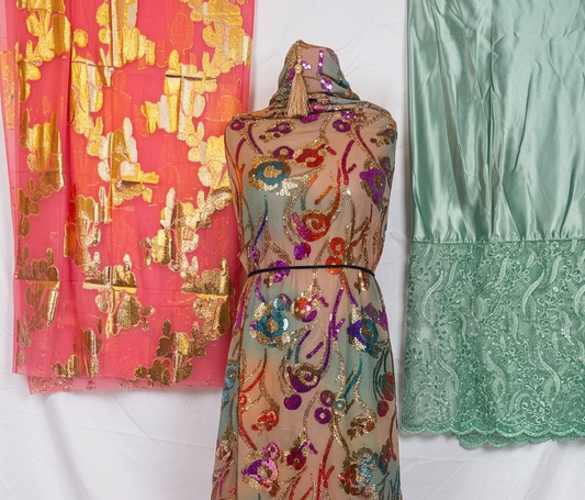 Floral embroidered dress with colorful patterns on a white background