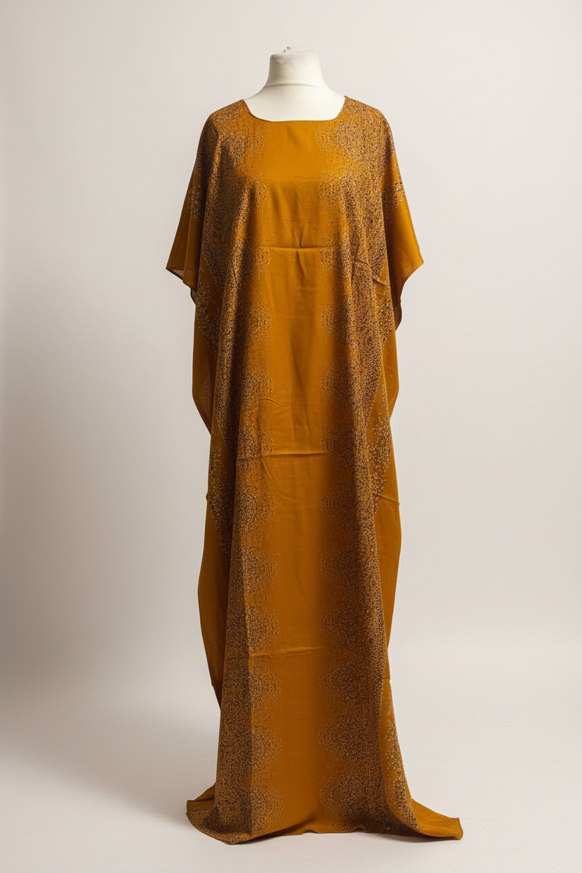 Mustard yellow Somali baati dress with lace details on a mannequin against a white background