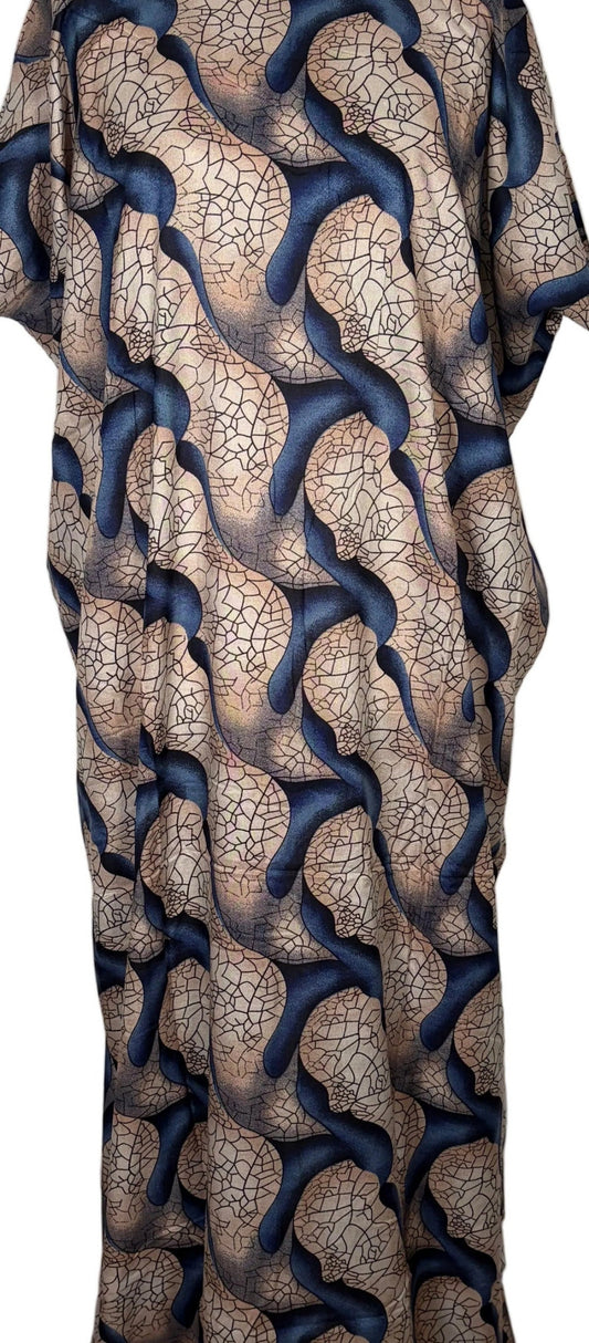 Patterned Somali Baati dress on a mannequin against a white backdrop